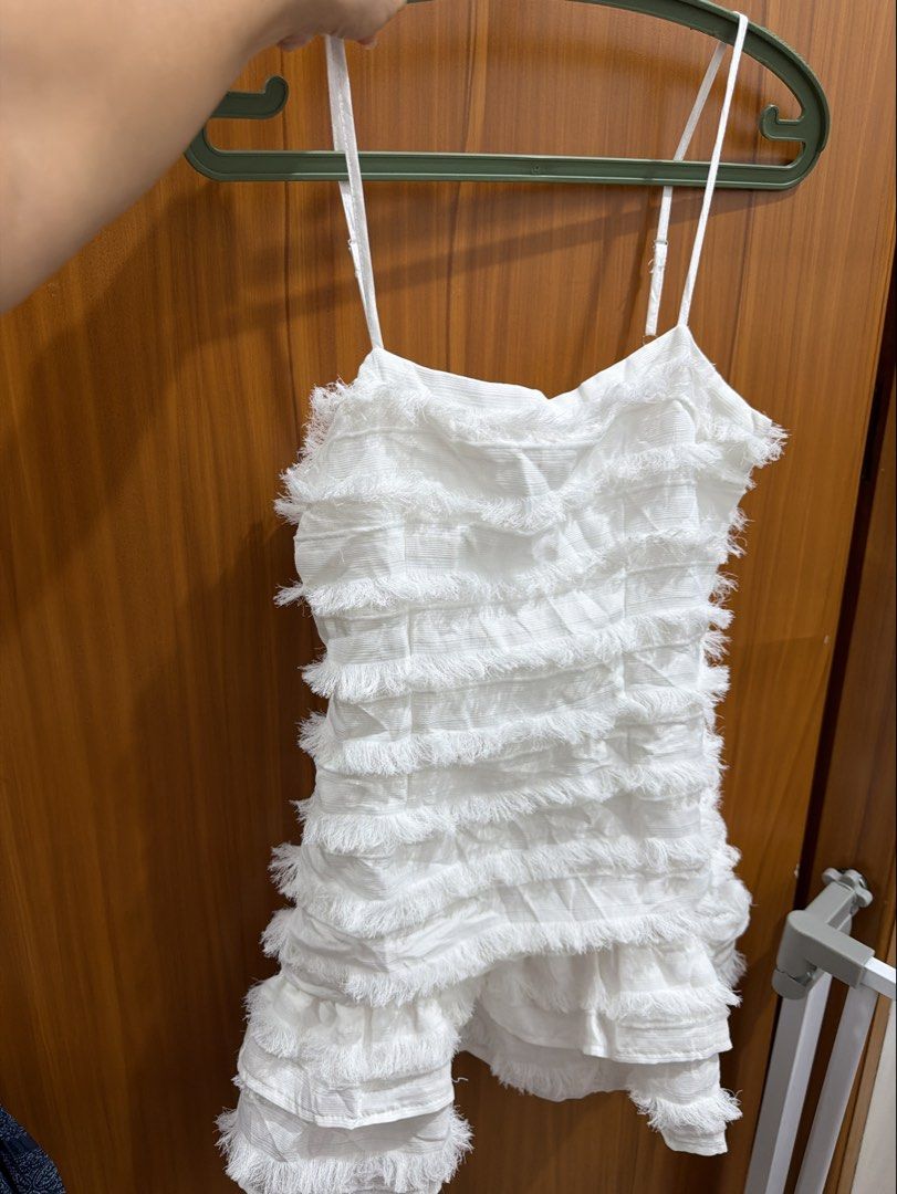 White Fringe Mini Dress Size Small (Category: Dresses) located in Makati City. Submitted by petite_preloved2 (Listing ID 1469481082, Image 1). Description: Adjustable strap Best fit for short girls.