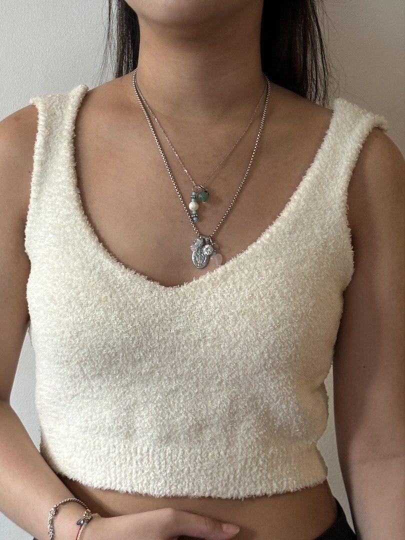 White Fur Sleevless (Category: Sleeveless) located in Quezon City. Submitted by wear.again.ph (Listing ID 1469516279, Image 1). Description: 🩵 Negotiable 🩵 Model’s size: Small.