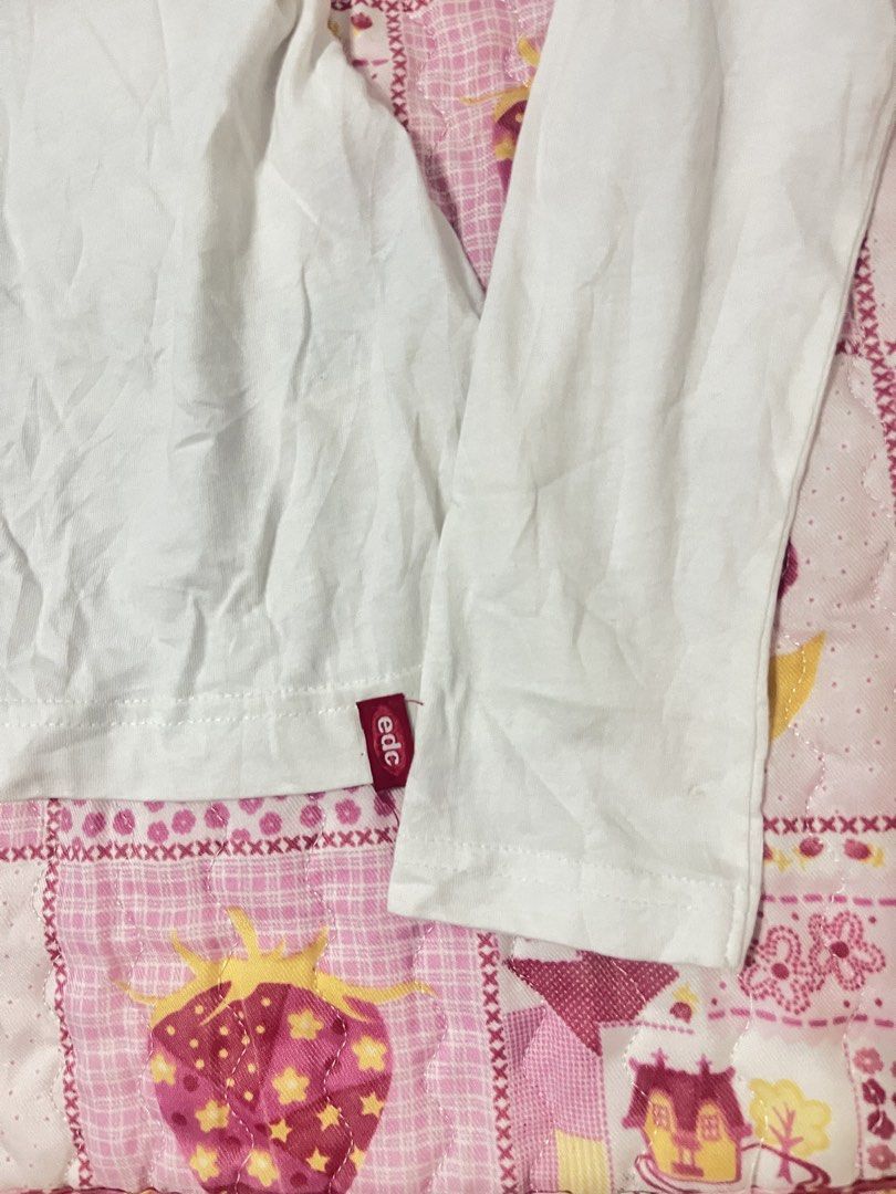 White longsleeves edc top (Category: Sleeveless) located in Davao. Submitted by lovedfaerie (Listing ID 1469530266, Image 3). Description: Xs-semi m no flaws.