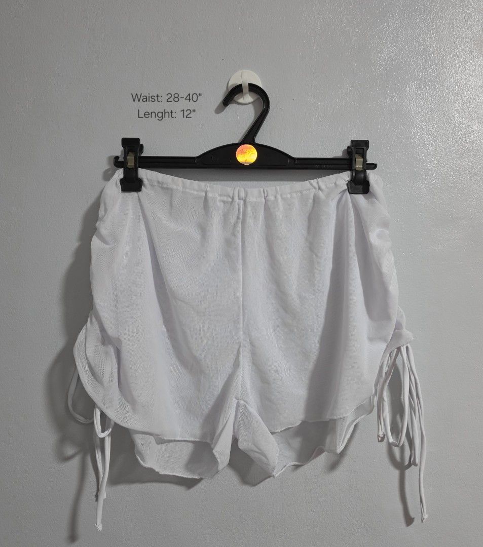 White Mesh Beach Cover-up Shorts Drawstring Sides (Category: Shorts) located in Paranaque City. Submitted by franinnashop (Listing ID 1469528306, Image 1). Description: declutter - Color: White - Style: Mesh beach/pool cover-up shorts - Fit: Waist fits 28 to 40 inches - Length: 12 inches (adjustable via drawstring sides) - Fabric: See-through, very lightweight, and breezy.