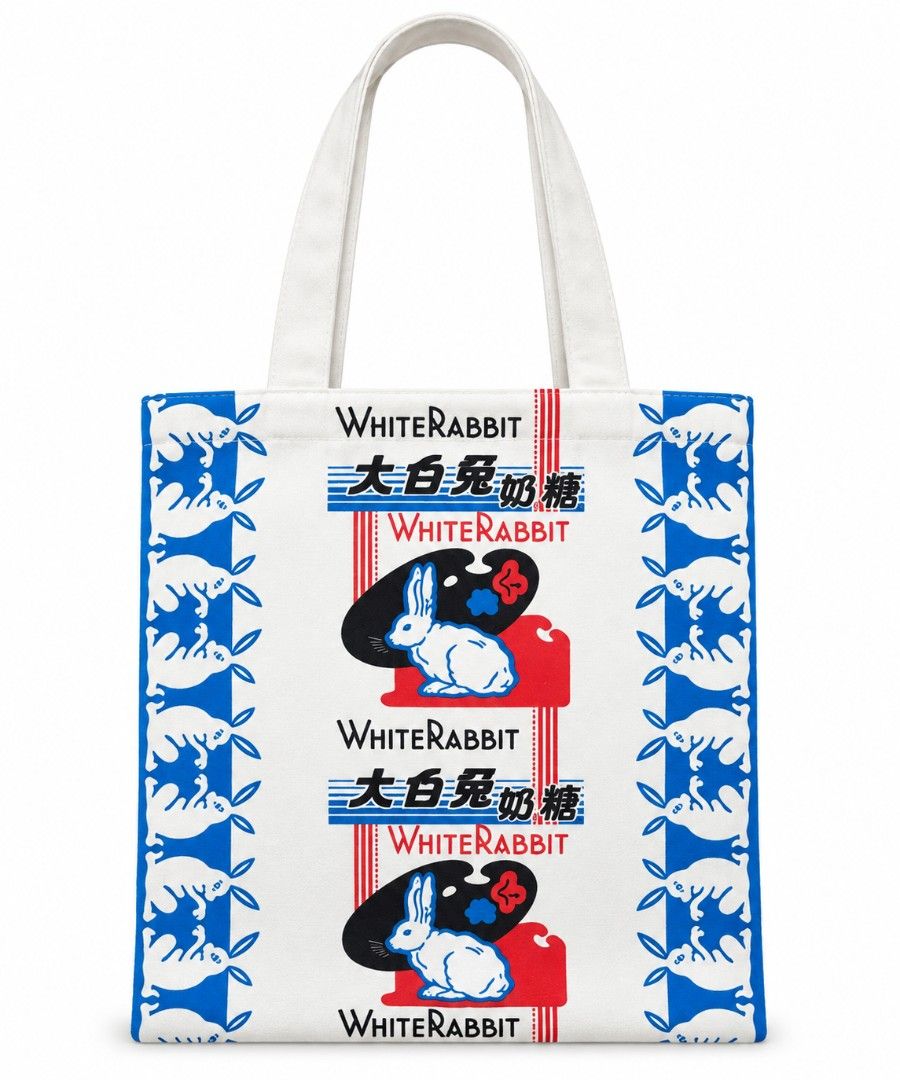 White Rabbit Candy Canvas Tote Bag (Category: Tote Bags) located in Pasig City. Submitted by swipeandpicks (Listing ID 1469518938, Image 1). Description: • Color: Classic White background with vibrant Royal Blue, Bright Red, and Black graphics mimicking the iconic vintage candy wrapper. • Material: Thick, durable, and eco-friendly cotton canvas fabric. Strong stitched shoulder straps for everyday heavy carrying. • Style: Retro / Y2K Nostalgia / H
