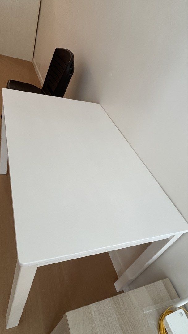 White rectangular dining table study desk (Category: Tables & Sets) located in Kuala Lumpur. Submitted by helenhsin23 (Listing ID 1469533730, Image 2). Description: White Solid Wood Dining / Study Table Details: * Material: Solid Wood * Colour: White * Size: 120cm (L) × 75cm (W) × 75cm (H) * Condition: Well maintained, with minor signs of use 📍 Self-pickup in Penang. Delivery can be arranged at buyer’s cost. Feel free to PM if interested!.