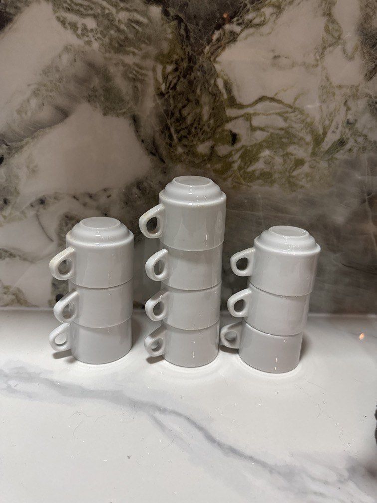 White Stacking Espresso Cups Set Of Ten (Category: Coffee & Tea Tableware) located in Manila. Submitted by decluterthings888 (Listing ID 1469427348, Image 1). Description: - Set of 10 white ceramic espresso cups - Glossy minimalist finish - Stackable design for vertical storage - Space-saving solution for small kitchens or coffee stations - Clean and ready to use 10 pcs MINI ( ₱450) 10 pcs regular (₱550).