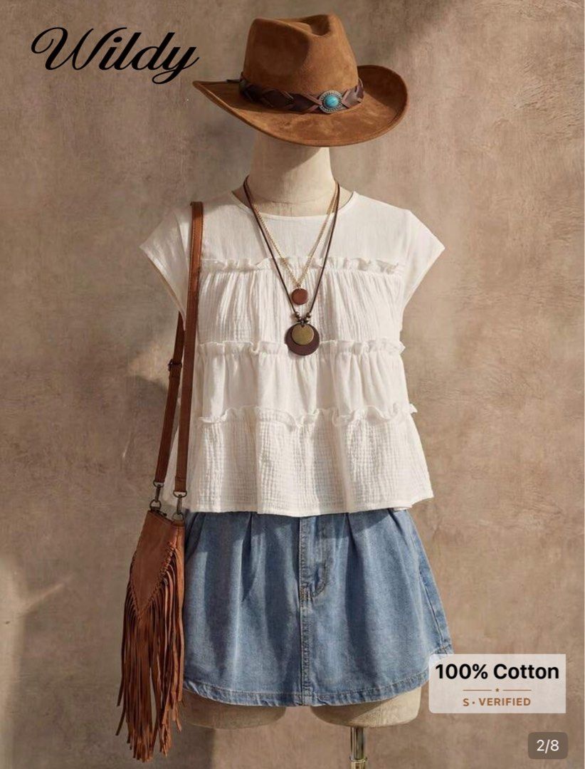 Wildy White Cotton Ruffled Tiered Sleeveless Blouse (Category: Sleeveless) located in Pasig City. Submitted by lai028 (Listing ID 1469534712, Image 2). Description: Super nice fabric, brandnew (selling coz it’s big on me - Size - best fit medium - Brand: Wildy - Material: 100% breathable cotton - Color: White - Design: Three-tiered with delicate ruffled trim details and round neckline - Fit: Casual and breezy - Best paired with: Denim skirts or s
