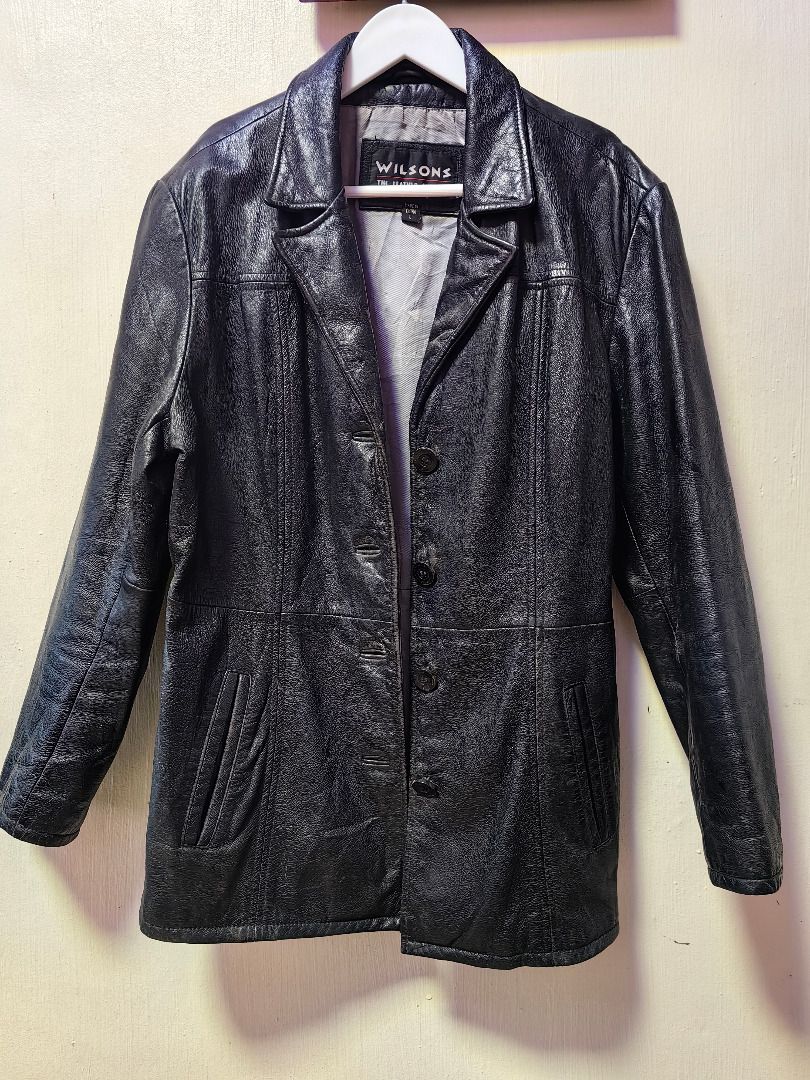 Wilsons Vintage Black Textured Leather Coat Jacket (Category: Coats, Jackets and Outerwear) located in Tarlac. Submitted by jeremiah.curator.2026 (Listing ID 1469400257, Image 1). Description: - Brand: Wilsons - Color: Black with a textured, shiny finish - Closure: Standard button-up front - Design: Classic collar, structured back panels, and stylish striped inner lining - Material/Condition: Warm, durable, heavy winter outerwear - Ideal for: Col