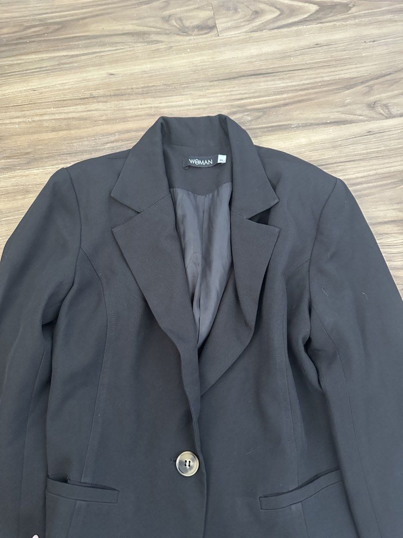 Woman Black Single Button Blazer Size XS (Category: Coats, Jackets and Outerwear) located in Paranaque City. Submitted by declutterwyae (Listing ID 1469404063, Image 3). Description: - Brand: Woman - Size: XS - Color: Black - Closure: Single front button - Details: Structured lapel collar, two side flap pockets, fully lined - Style: Perfect for office wear or smart casual outfits.