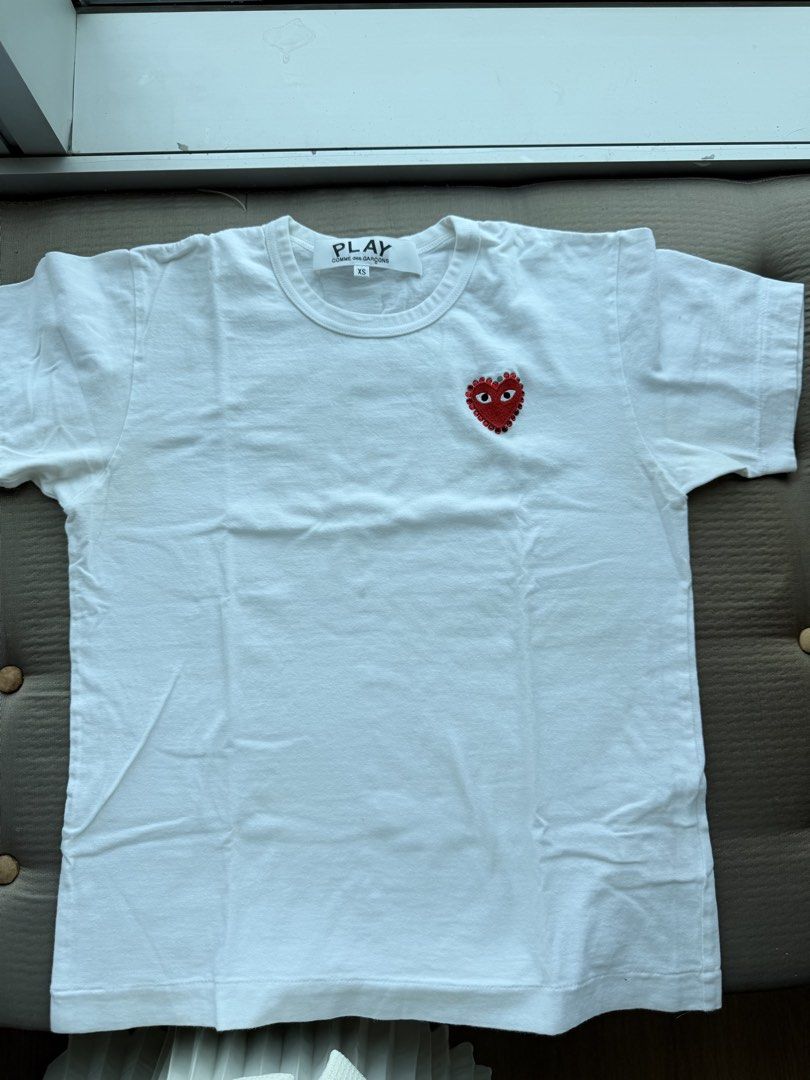 Womens CDG Play Shirt (Category: Shirts) located in Pasig City. Submitted by atty.angelajenner (Listing ID 1469537837, Image 1). Description: Missing 1 rhinestone. Authentic from Japan..