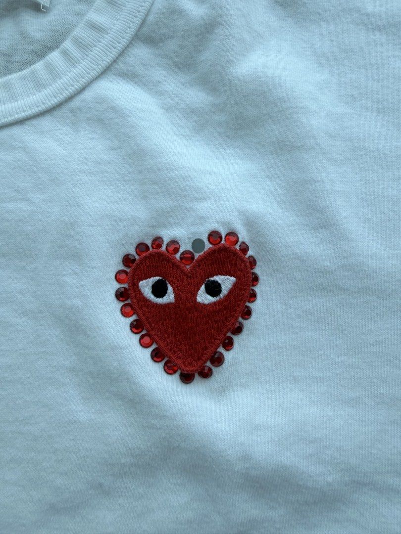 Womens CDG Play Shirt (Category: Shirts) located in Pasig City. Submitted by atty.angelajenner (Listing ID 1469537837, Image 2). Description: Missing 1 rhinestone. Authentic from Japan..