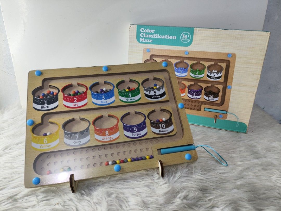Wooden Color Classification Maze Sorting Board Toy (Category: Educational & Learning Toys) located in Cavite. Submitted by tinetaclesss (Listing ID 1469498051, Image 1). Description: - Suitable for toddlers aged 36 months and up - Features a wooden color classification maze with an attached magnetic pen - Includes wooden stand supports and original box packaging - Promotes fine motor skills, color recognition, and sorting practice - Safe design w