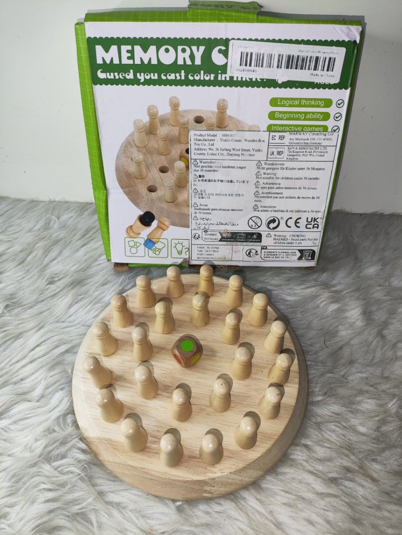 Wooden Memory Chess Color Matching Board Game (Category: Board Games & Puzzles) located in Cavite. Submitted by tinetaclesss (Listing ID 1469498239, Image 1). Description: - Fun wooden memory chess game designed for kids - Helps develop logical thinking, memory, and cognitive skills - Complete set: includes round wooden board, colorful pegs, and dice - Comes with the original box.
