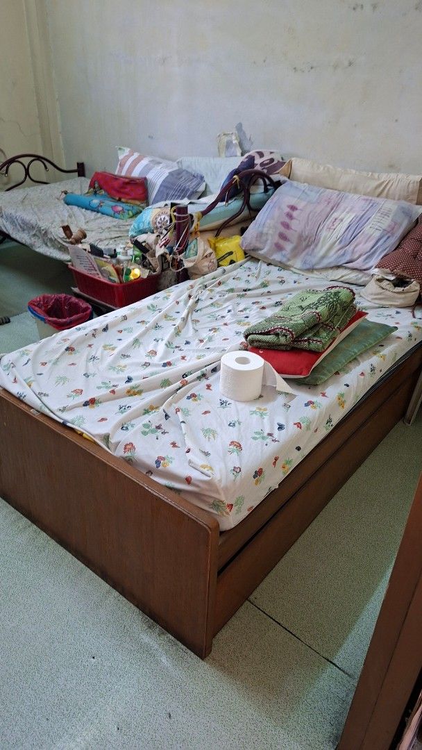Wooden single bed frame with pull out (Category: Bed Frames & Mattresses) located in Manila. Submitted by daisythejane (Listing ID 1469537341, Image 1). Description: ❗️available by mid dec 2026 pa ❗️ - Type: Wooden single bed frame with pull out bed - Features: Solid wooden headboard and durable side panels - Size: Standard single, perfect for small bedrooms or guest rooms - Can include mattress but warning very old already size: 77in length 38.5