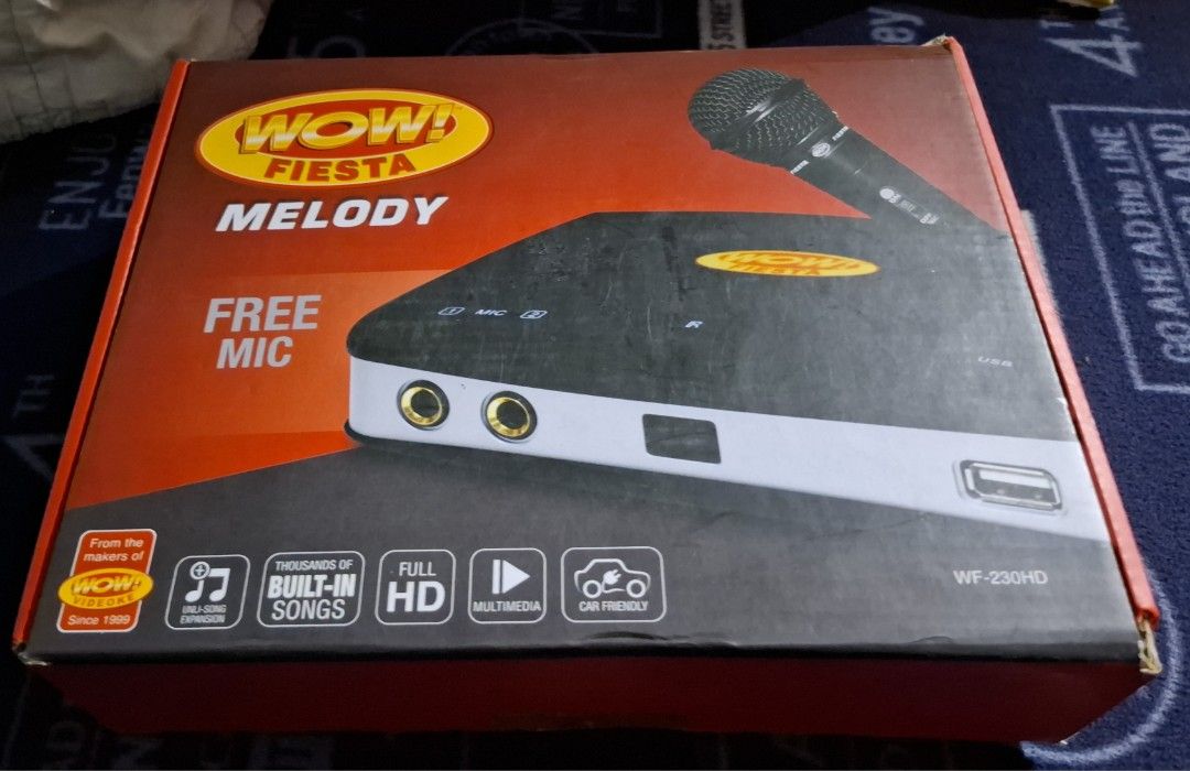 Wow fiesta melody (Category: Portable Music Players) located in Manila. Submitted by morphiouz15 (Listing ID 1469406676, Image 1). Description: Good as new Complete accesories with box 1 Main unit 1 professional wired mic 1 Remote 1 RCA cable 1 autovolts power adaptor 1 songlist and user manual Note: HDMI ready for High Definition.