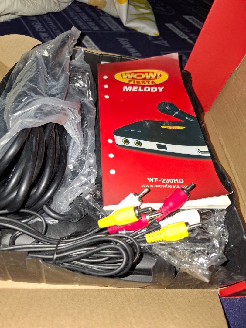 Wow fiesta melody (Category: Portable Music Players) located in Manila. Submitted by morphiouz15 (Listing ID 1469406676, Image 3). Description: Good as new Complete accesories with box 1 Main unit 1 professional wired mic 1 Remote 1 RCA cable 1 autovolts power adaptor 1 songlist and user manual Note: HDMI ready for High Definition.
