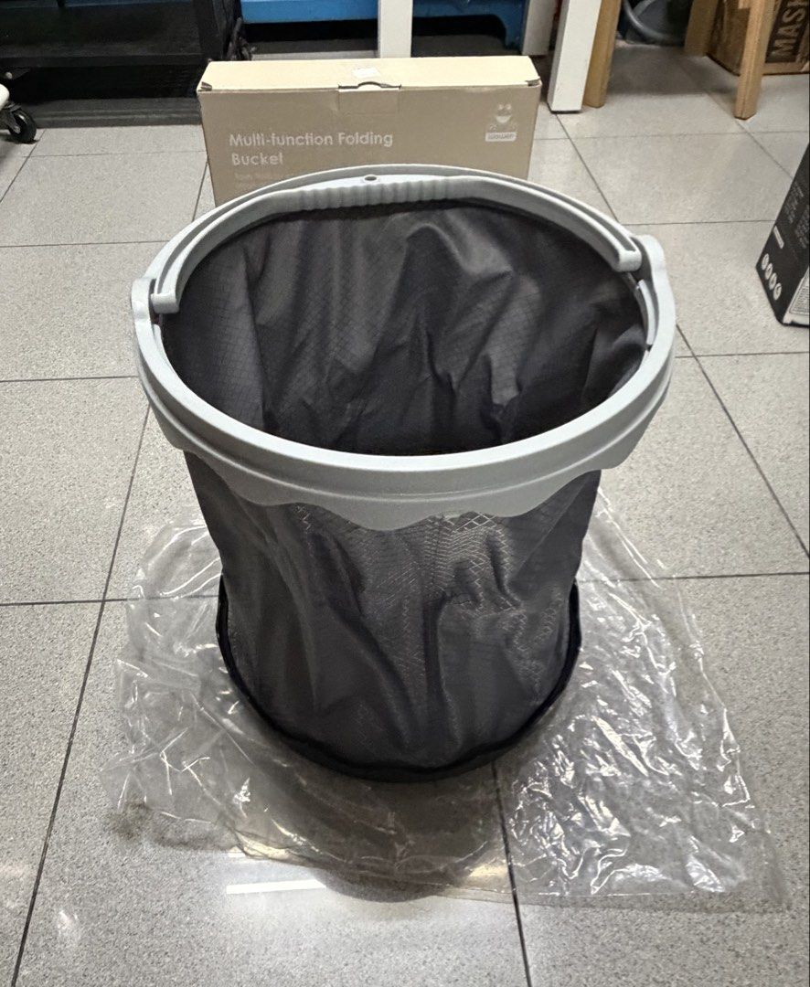 Wower 15L Multi-Function Folding Bucket, Foldable Camping Bucket, Camping Bucket (Category: Luxury Bags & Wallets) located in Pasay City. Submitted by jen.pen (Listing ID 1469464063, Image 2). Description: Grey 15-liter folding bucket by Wower. Collapsible design for easy storage and transport. Great for camping, car washing, cleaning, and outdoor trips. Lightweight and durable construction. Original box included, unopened in plastic packaging..