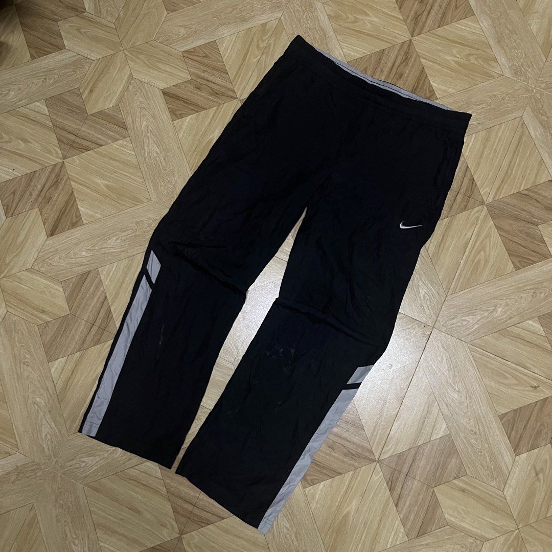 y2k nike trackpants (Category: Joggers) located in Cavite. Submitted by sacmaestro444 (Listing ID 1469524788, Image 2). Description: large on tag good condition issue logo not visible 9/10 colorate nego for sure buyer.