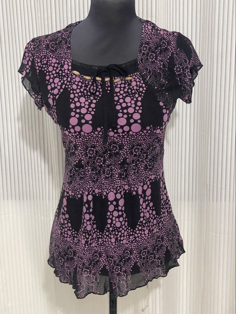 Y2K Purple Top (Category: Blouses) located in Tuguegarao City. Submitted by ziggerryy (Listing ID 1469540343, Image 2). Description: No flaws. No holes Fits S-M No tags Please refer to the fourth pic for the cloth (di ko po kasi alam tawag😅) Super nice.