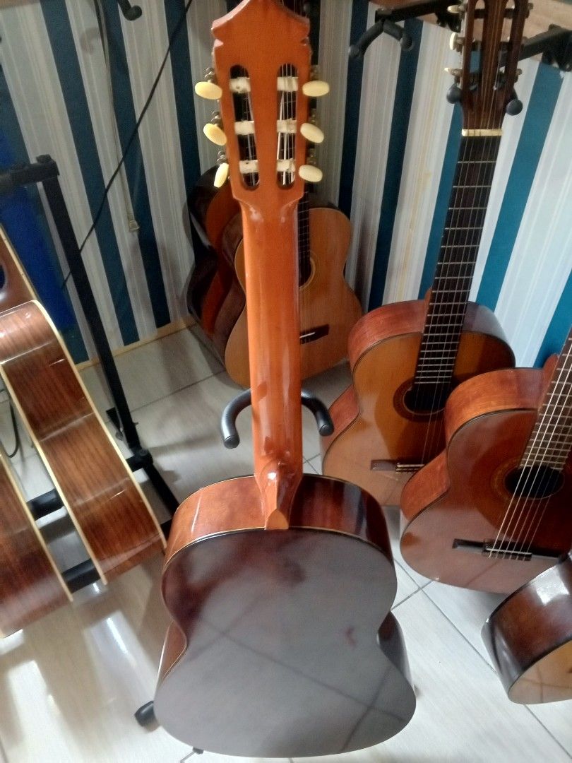 Yamaha C-80A Classical Guitar Nippon Gakki Co. Ltd. (Category: Musical Instruments) located in Manila. Submitted by papong89 (Listing ID 1469514515, Image 3). Description: - Model: Yamaha C-80A Classical Guitar (Vintage Nippon Gakki Co. Ltd. production) - Body: Standard classical shape with a classic natural wood finish and detailed soundhole rosette - Hardware: Nylon strings and traditional slotted headstock - Condition: Normal signs of handling