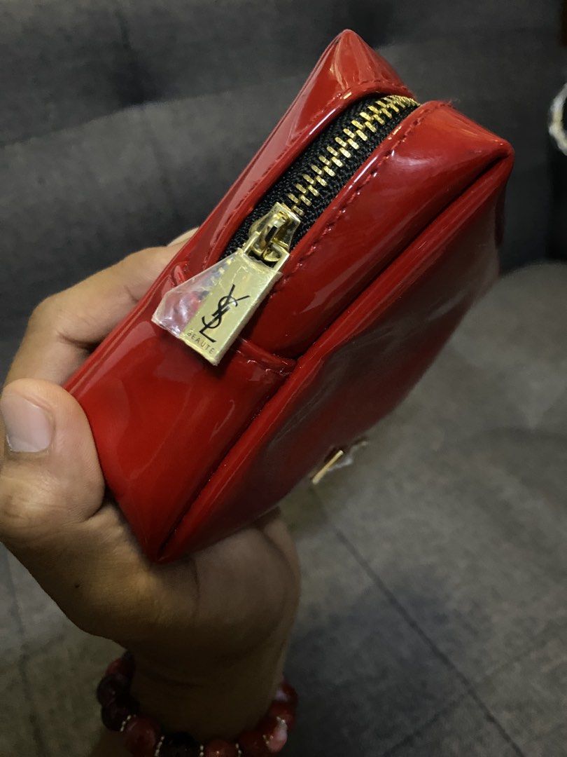 Yves saint lauren pouch (Category: Luxury Bags & Wallets) located in Caloocan City. Submitted by luxurymurayta888 (Listing ID 1469472235, Image 3). Description: no issue.