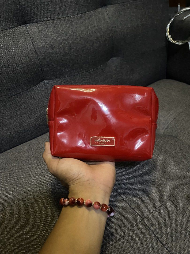 Yves saint lauren pouch (Category: Luxury Bags & Wallets) located in Caloocan City. Submitted by luxurymurayta888 (Listing ID 1469472235, Image 2). Description: no issue.