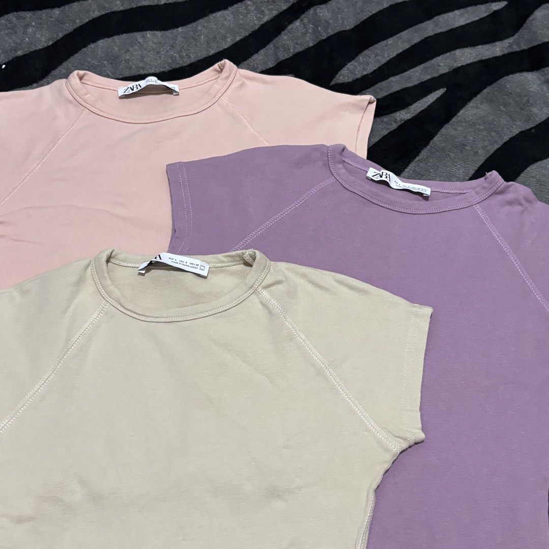 Zara basic ribbed top bundle (Category: Shirts) located in Caloocan City. Submitted by declutter.cal (Listing ID 1469542536, Image 3). Description: Xs-s Like new Take all 280 Basic ribbed - pink, purple, beige Polo cropped - black.