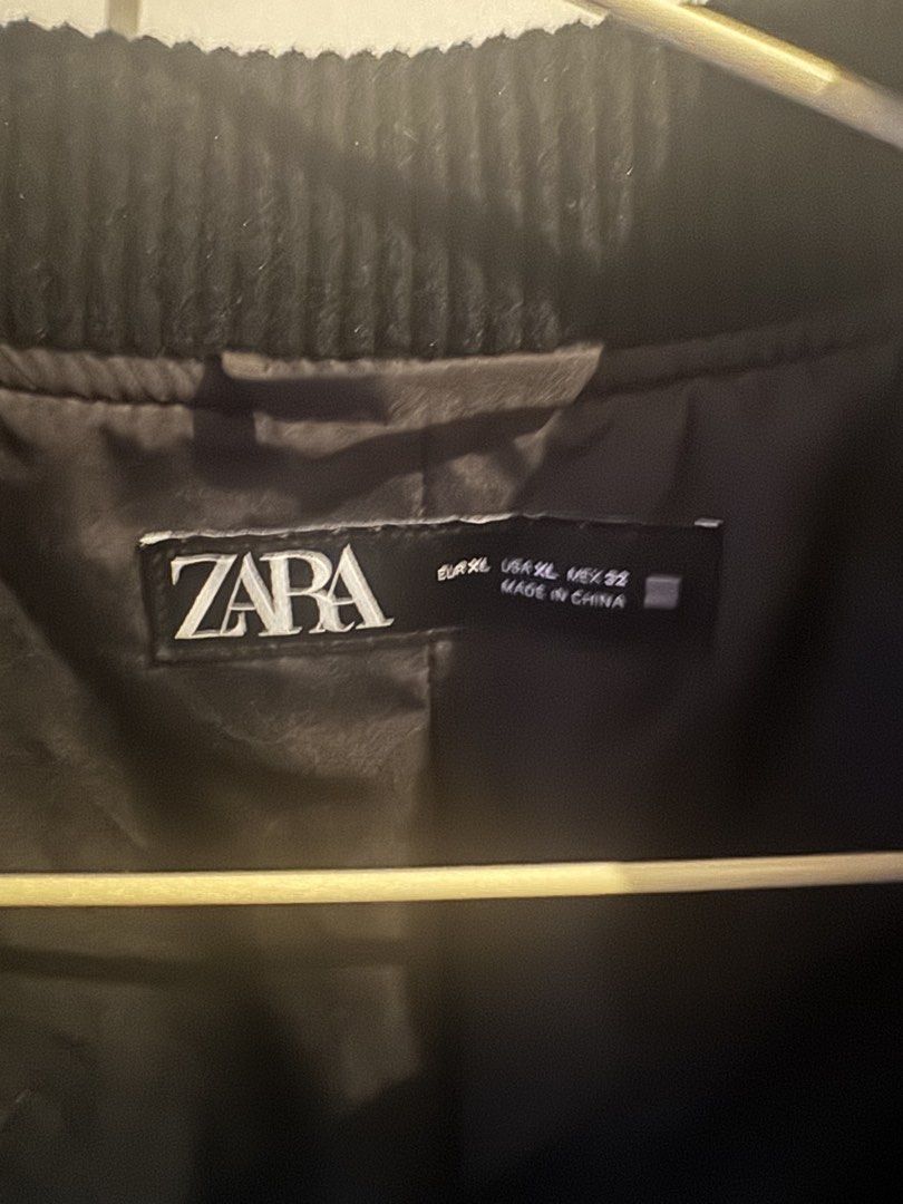 Zara Black Bomber Jacket Size XL (Category: Coats, Jackets and Outerwear) located in Makati City. Submitted by kpmg111 (Listing ID 1469478978, Image 2). Description: - Brand/Model: Zara Black Bomber Jacket - Size: XL - Color: Deep black - Design: Classic varsity silhouette with snap button closure - Details: Ribbed collar and hem, heavy fabric with inner lining - Condition/Use: Great layering piece for colder days.