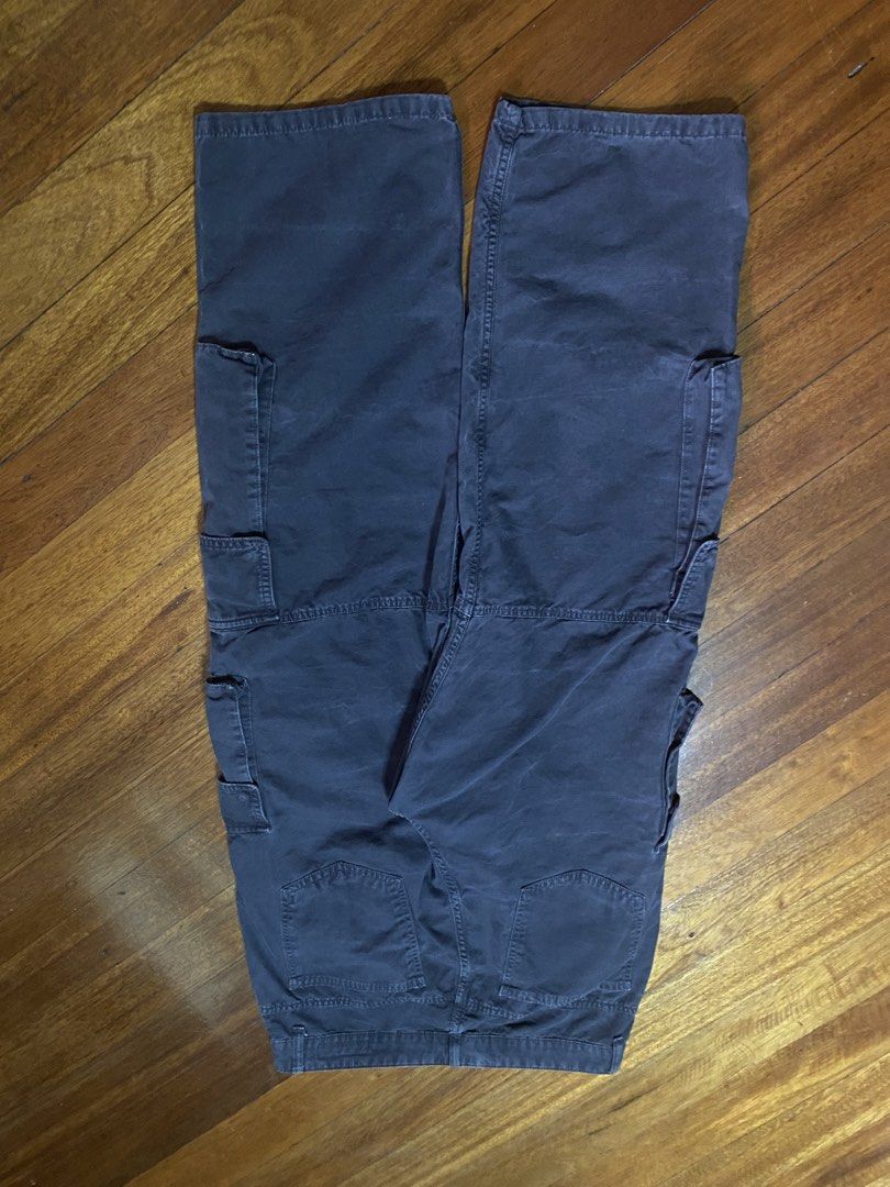 Zara Cargo Pants Size USA 34 Dark Grey (Category: Jeans) located in Baguio. Submitted by cs_studio248 (Listing ID 1469460981, Image 3). Description: - Brand: Zara - Size: USA 34 - Color: Dark grey with natural fading - Material: Heavy cotton twill (Made in Bangladesh) - Fit: Relaxed, baggy fit through thighs and calves - Waist: Mid-rise with button closure and belt loops - Pockets: Multiple utility pockets on both legs.