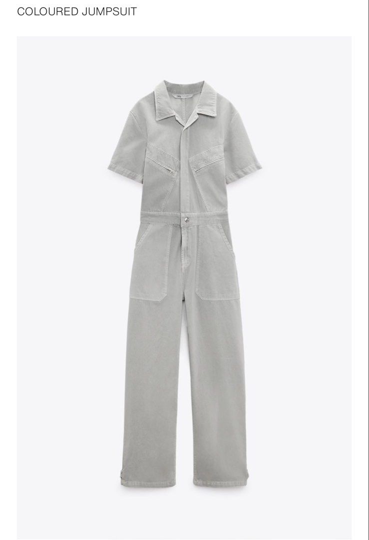 Zara Coloured Jumpsuit Grey Size XS (Category: Jumpsuits) located in Binangonan. Submitted by curatedbyjuys (Listing ID 1469442571, Image 1). Description: - Brand: Zara - Style: Short-sleeve utility jumpsuit with straight leg fit - Color: Grey - Size: XS (Made in Morocco) - Details: Collared neck, button-front closure, zip chest pockets, and leg patch pockets - Condition: Brand new with original tags attached (€49.95 retail price).