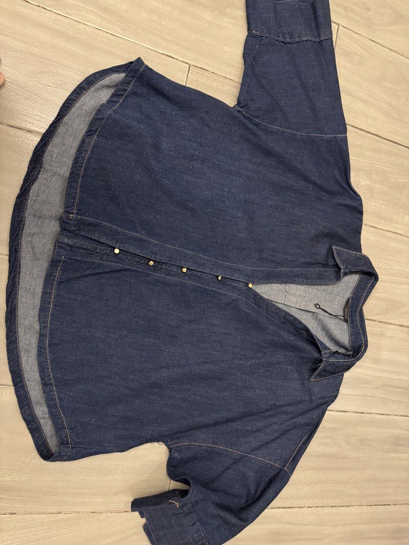 ZARA Denim Button-Down Shirt Size XL (Category: Shirts) located in Taguig. Submitted by sqaumejada (Listing ID 1469415695, Image 1). Description: - Brand: ZARA - Item: Denim shirt - Color: Dark blue wash - Size: EUR/USA XL / MEX 32 - Condition: Brand new with tags attached - Material: Denim with visible grain - Details: Long sleeves, metallic front buttons, classic collar, rounded high-low hem - Origin: Made in Morocco.