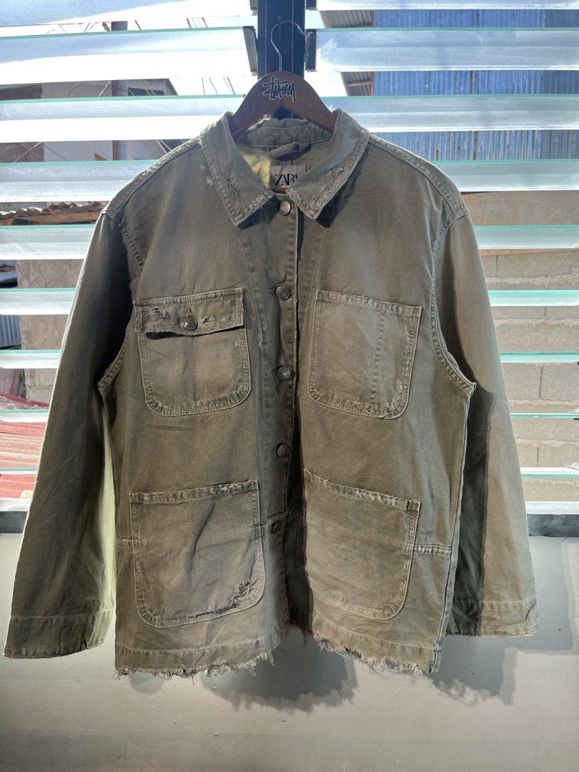 Zara Distressed Utility Jacket Sage Green Size M (Category: Coats, Jackets and Outerwear) located in Manila. Submitted by thrifttika (Listing ID 1469449464, Image 1). Description: - Brand/Item: Zara Utility Jacket - Color: Sage Green - Size: Medium (EUR/USA M) - Material: Heavy canvas cotton - Features: Button-down front with metal buttons, multiple utility pockets on chest and lower front - Details: Trendy distressed accents on collar, pockets, 