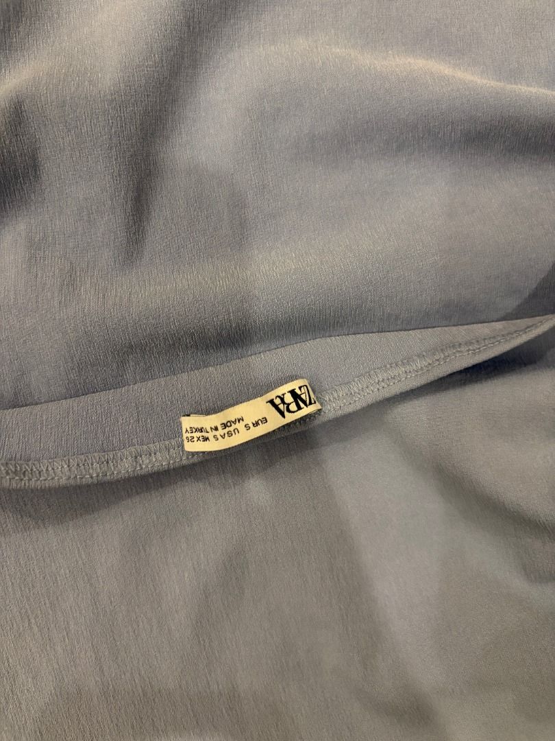 Zara Light blue halter neck top (Category: Sleeveless) located in Caloocan City. Submitted by jadorearchive (Listing ID 1469519787, Image 3). Description: Size small Only worn twice :) Has ruching along the one side, soft and stretchy fabric .