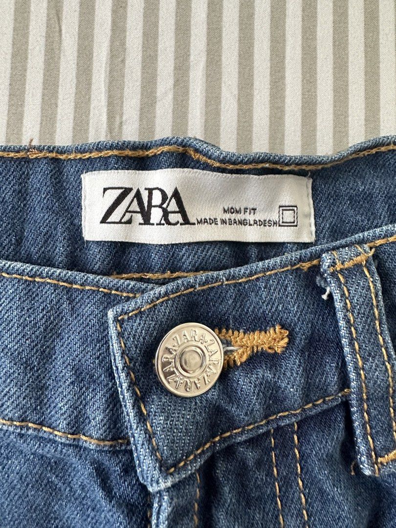 Zara Mom Fit Denim Shorts (Category: Shorts) located in Quezon City. Submitted by 4k_cam (Listing ID 1469453502, Image 3). Description: - Brand: Zara - Style: Mom fit denim shorts - Color/Wash: Dark blue wash - Design: Cuffed hems, classic five-pocket style with contrast stitching - Hardware: Silver-toned metal button closure.