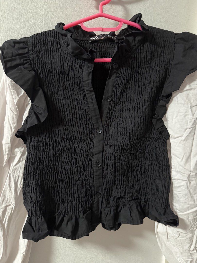 Zara Smocked Button Down (Category: Blouses) located in Mandaluyong City. Submitted by blzstr (Listing ID 1469433880, Image 3). Description: - Black smocked bodice with contrasting white balloon sleeves - Ruffle detailing on shoulders and neckline, button-up front closure - Origin: Made in Turkey.