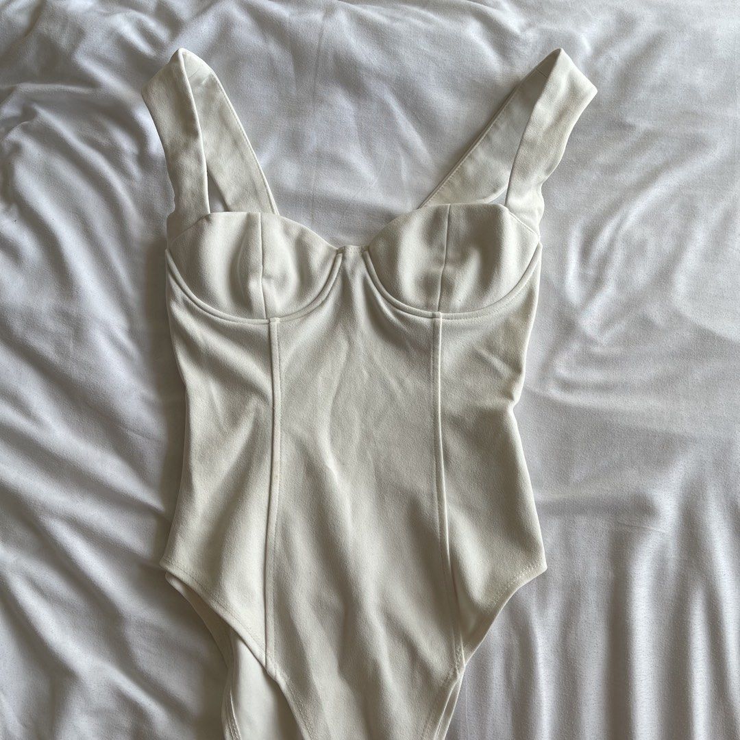 Zara White Corset Bodysuit (Category: Others Tops) located in Quezon City. Submitted by fifionugh (Listing ID 1469424596, Image 1). Description: .