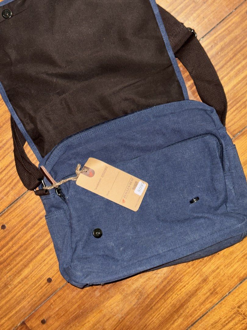 Zuo Lun Duo Canvas Messenger Bag Blue (Category: Sling Bags) located in Manila. Submitted by jaggylejano (Listing ID 1469497953, Image 2). Description: Never been used sling/laptop bag. In great condition, canvas material.