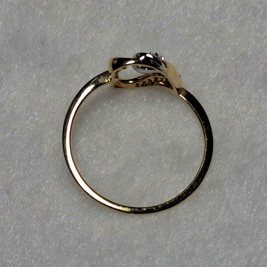 18k Diamond Ring (Category: Rings) located in Manila. Submitted by treasurechest888 (Listing ID 1469649871, Image 2). Description: Preowned 18k gold diamond heart ring (.04ct, 1.40 grams, size 6.5). Pwede COD or COP ng LBC with 1,000 pesos downpayment..