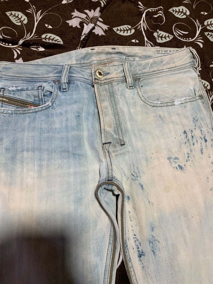 2000s DIESEL Zatiny Paint Splatter Bootcut Jeans (Category: Jeans) located in Bislig. Submitted by rndm_stff1 (Listing ID 1469607103, Image 2). Description: Rare archival Y2K bootcut jeans from Diesel (Model: Zatiny, Wash: 008GR. Features a heavily treated light bleach wash with artistic blue paint splatter effects, button fly, and signature Diesel pocket detailing. A highly collectible piece of early 2000s designer denim. Details: - Brand: DIESE