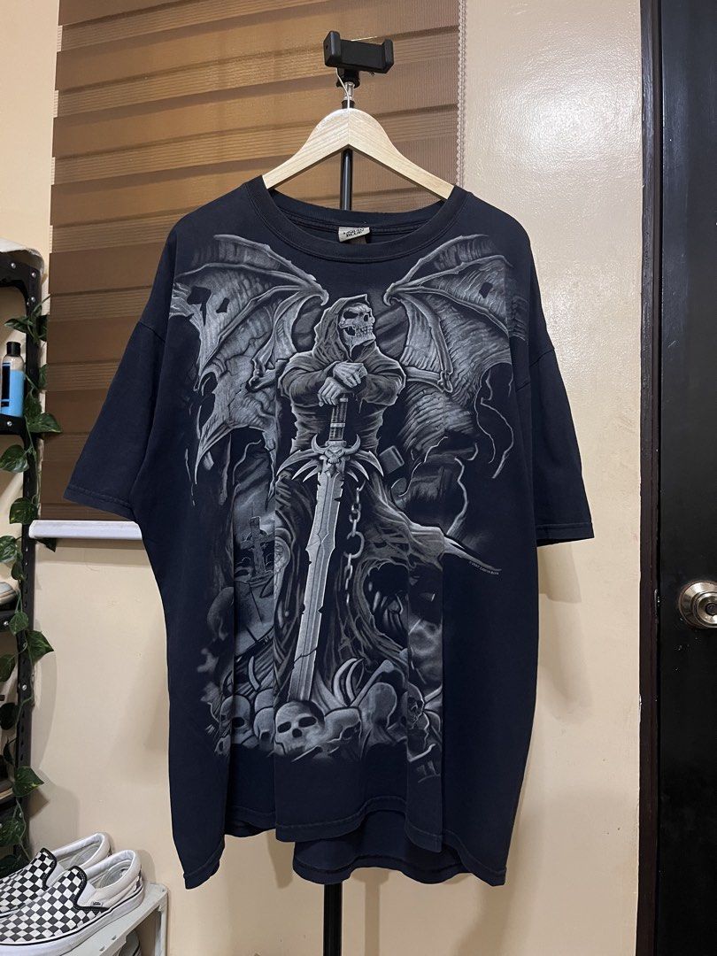 2007 Liquid Blue Gravestone Grim Reaper Tee (Category: Tshirts & Polo Shirts ) located in Bulacan. Submitted by r_adventures_thrift (Listing ID 1469681785, Image 1). Description: Sz XL Minimal distress and pinholes Solid pang psg at pang holloween nyo ₱2,500+sf only .