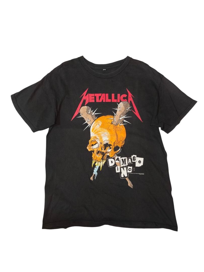 2016 Dated Metallica Damage Inc. Tour Graphic Tee (Category: Tshirts & Polo Shirts ) located in Baguio. Submitted by boneteezandharmony (Listing ID 1469663854, Image 1). Description: Black Metallica graphic tee featuring the iconic Damage Inc. skull artwork on the front and a colorful Damage Inc. Tour graphic on the back. A standout piece for rock and metal fans. Condition: 7/10 Good Fade Dimes: Approx. 21W × 29L.