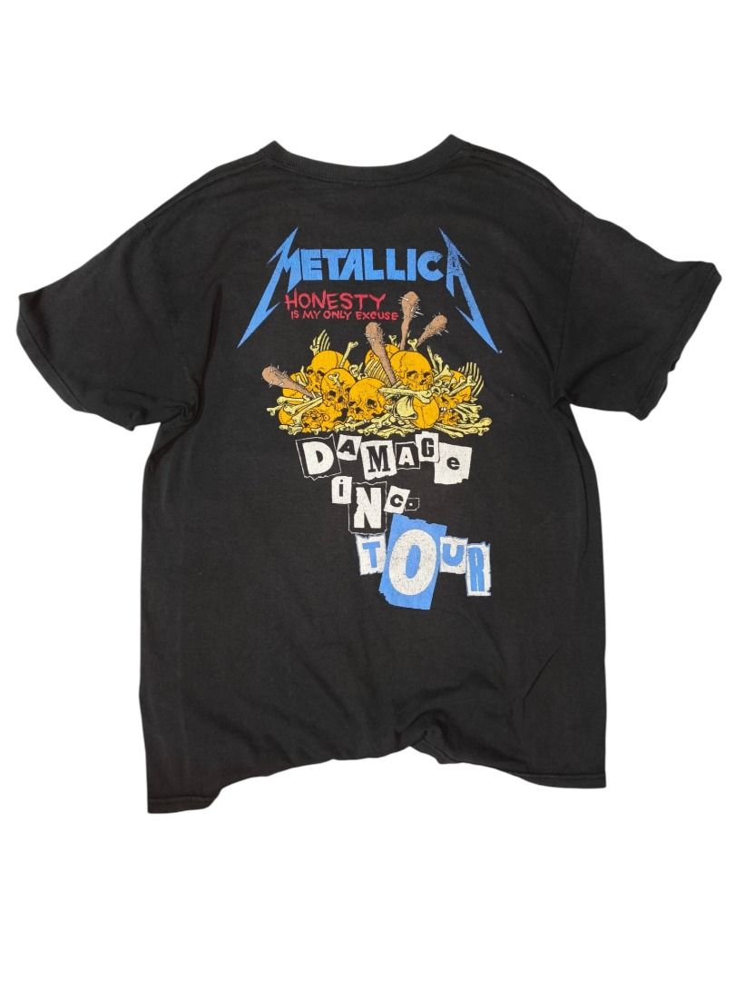 2016 Dated Metallica Damage Inc. Tour Graphic Tee (Category: Tshirts & Polo Shirts ) located in Baguio. Submitted by boneteezandharmony (Listing ID 1469663854, Image 2). Description: Black Metallica graphic tee featuring the iconic Damage Inc. skull artwork on the front and a colorful Damage Inc. Tour graphic on the back. A standout piece for rock and metal fans. Condition: 7/10 Good Fade Dimes: Approx. 21W × 29L.
