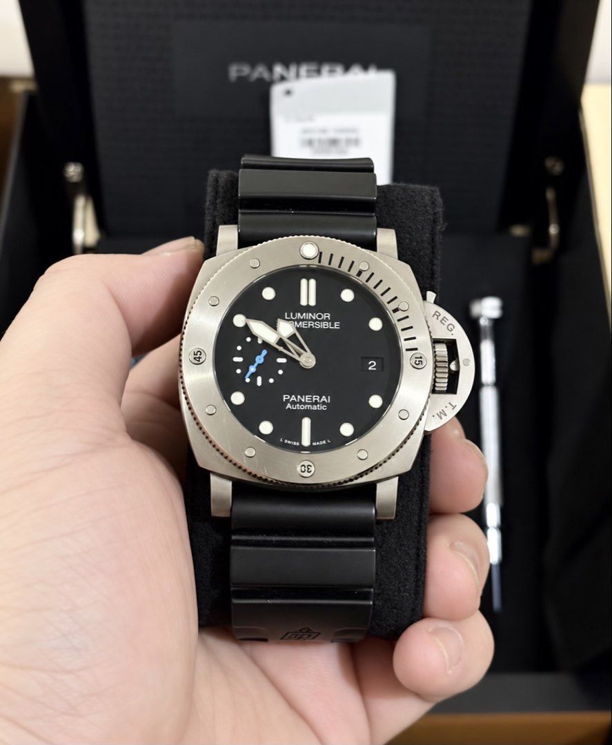 2017 Panerai Submersible PAM1305 - Complete set (Category: Luxury Watches) located in Mandaluyong City. Submitted by brian.1988 (Listing ID 1469598833, Image 2). Description: 2017 Panerai Submersible PAM1305 47mm - Complete set - Lightweight Titanium case - Local AD (Panerai Bonifacio High Street) - Unused extra Panerai leather strap - 9/10 excellent condition.