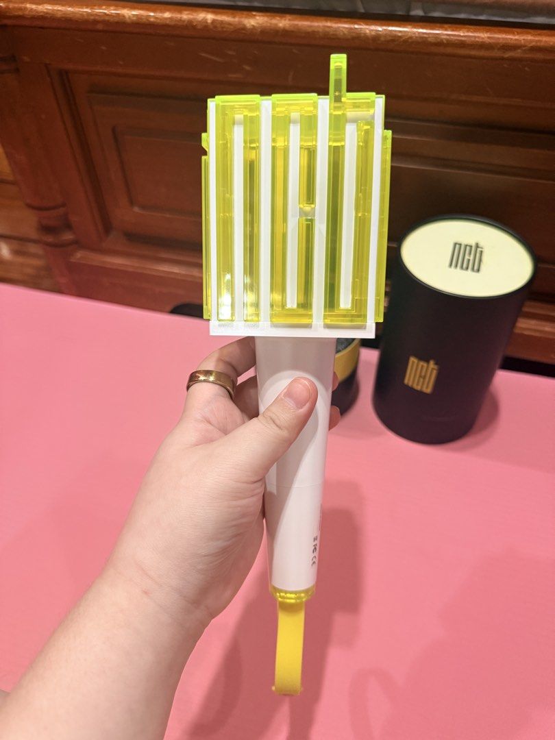 2022 NCT Official Fanlight Lightstick with Box (Category: K-Wave Merchandise) located in Tarlac. Submitted by starmie_quail (Listing ID 1469695140, Image 3). Description: - 100% Official NCT lightstick (Dreamus company, made in Korea) - Tested and fully working - Iconic neon green and white colorway with wrist strap - Includes original cylindrical black storage box with gold logo - Standard comfortable grip, perfect for concerts and collecting Sh