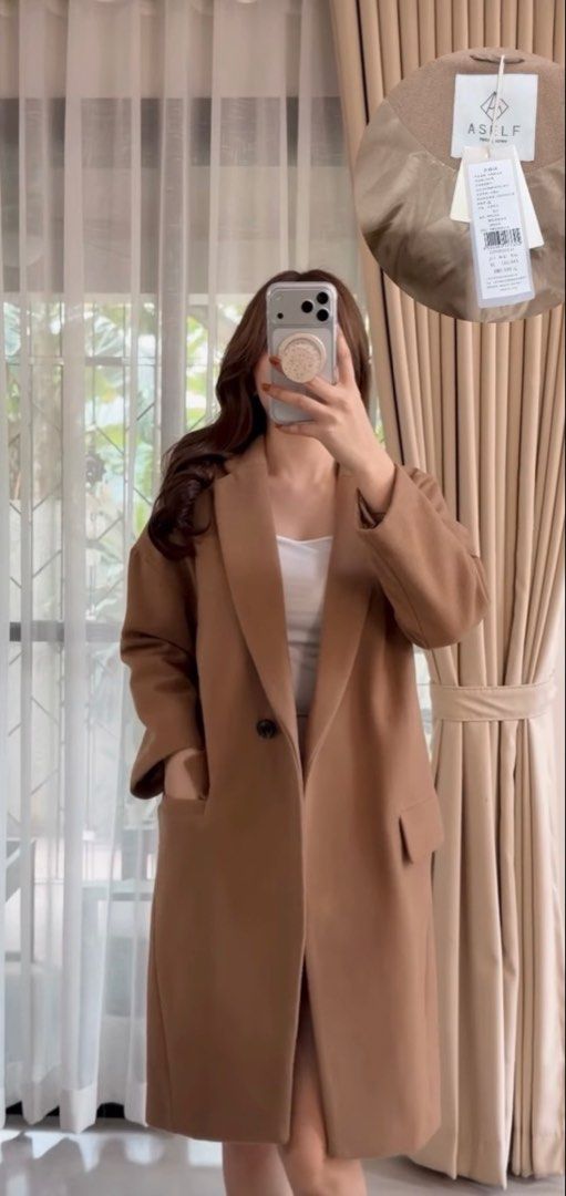 2 Wool Coat (Category: Coats, Jackets and Outerwear) located in Dasmarinas. Submitted by baclorprin57816 (Listing ID 1469589635, Image 1). Description: - Style: Long coat with lapel collar and single button closure - Colors Available: Brown and Black - Size: Medium (M) - Features: Large front pockets, fully lined interior, and smooth fabric texture - Condition: Brand new (tag attached on the brown piece) Take all for 1,500.