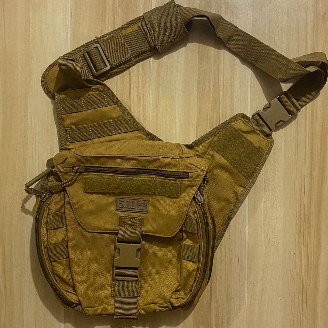 5.11 Tactical Rush Moab 10 Sling Bag Coyote (Category: Sling Bags) located in Bacolod City. Submitted by jeybe112019 (Listing ID 1469612902, Image 1). Description: - Brand: 5.11 Tactical - Color: Coyote Brown - Material: Heavy-duty, durable nylon - Compartments: Multiple zippered pockets and internal mesh organizers - Customization: MOLLE webbing and velcro panels for patches on the front and strap - Fit: Adjustable shoulder strap with secure buc