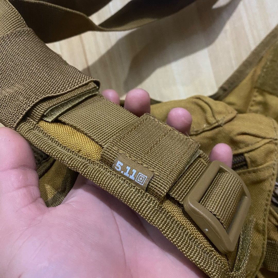 5.11 Tactical Rush Moab 10 Sling Bag Coyote (Category: Sling Bags) located in Bacolod City. Submitted by jeybe112019 (Listing ID 1469612902, Image 3). Description: - Brand: 5.11 Tactical - Color: Coyote Brown - Material: Heavy-duty, durable nylon - Compartments: Multiple zippered pockets and internal mesh organizers - Customization: MOLLE webbing and velcro panels for patches on the front and strap - Fit: Adjustable shoulder strap with secure buc