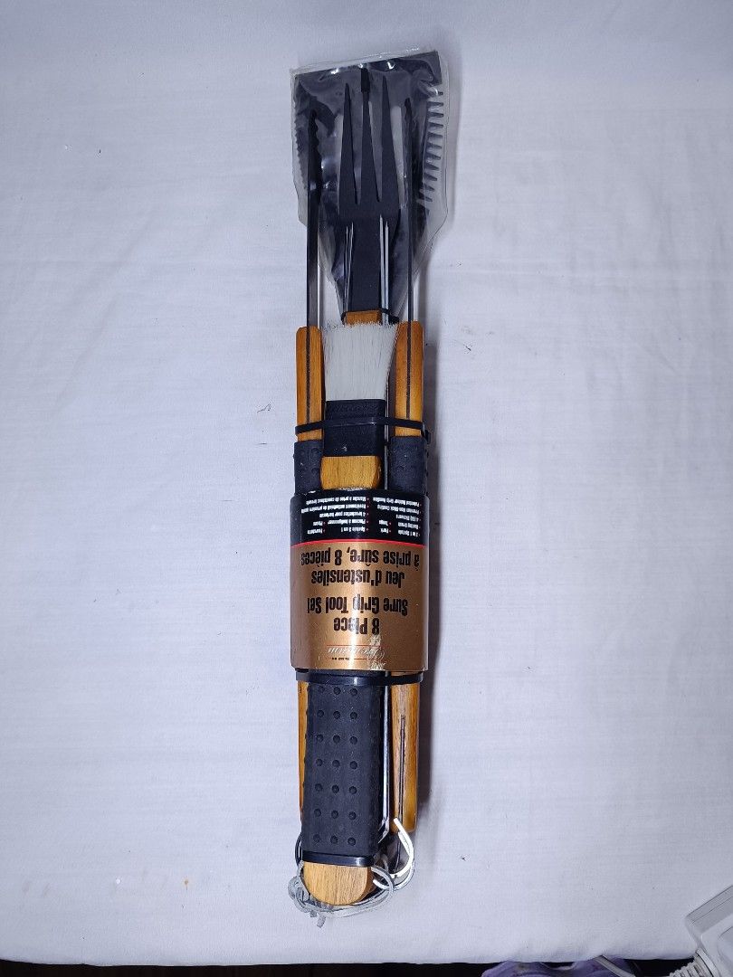 8 Piece Premium Sure Grip BBQ Tool Set (Category: Cookware & Accessories) located in Baguio. Submitted by clothes.over.bros.ph_2020 (Listing ID 1469596222, Image 1). Description: - Complete 8-piece BBQ set: 3-in-1 spatula, fork, tongs, basting brush, and 4 skewers - Premium non-stick coating for easy cooking and cleaning - Ergonomic wooden handles featuring patented black rubber grips for a secure, comfortable hold - Brand new and still sealed in