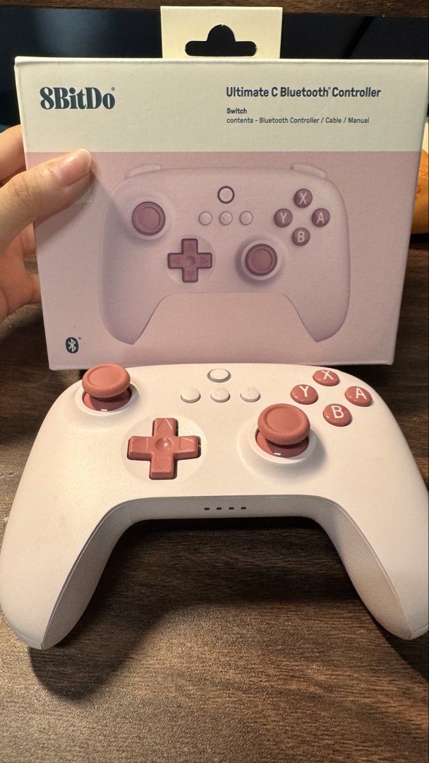 8BitDo Ultimate C Bluetooth Controller Pink (Category: Controllers) located in Makati City. Submitted by khyfra25 (Listing ID 1469631315, Image 1). Description: - Item: 8BitDo Ultimate C Bluetooth Controller (Pink, Model 80NB) - Compatibility: Designed for Nintendo Switch (Bluetooth & wired USB) - Condition: Barely used, excellent working condition - Inclusions: Original box, manual, and cable included - Reason for selling: Decluttering unused ga