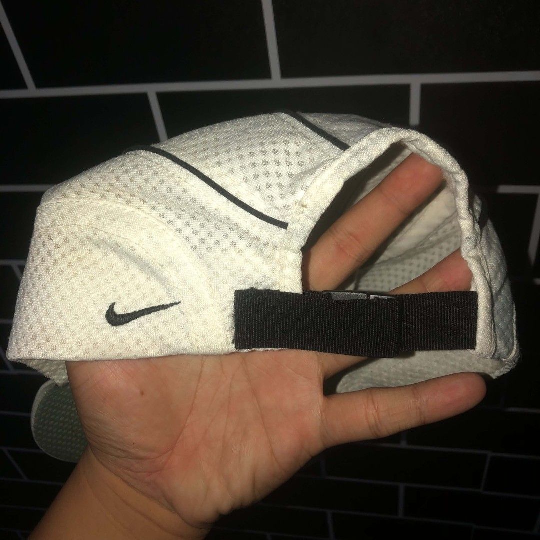 90's NikexAndre Agassi Challenge Court Mesh Cap (Category: Caps & Hats) located in Polomolok. Submitted by kimseranba40372 (Listing ID 1469698392, Image 2). Description: - Authentic 90's Nike white mesh 5-panel hat - Features the classic Agassi logo on the front - Embroidered black Swoosh on the side panel - Lightweight, perforated fabric for maximum breathability - Adjustable black strap with buckle closure in the back - Material: Polyester - Ma