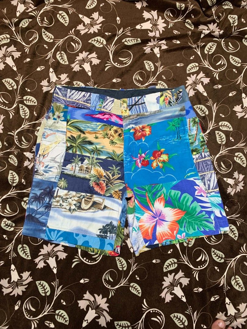 90s Patchwork Tropical Hawaiian Print Casual Shorts (Category: Shorts) located in Bislig. Submitted by rndm_stff1 (Listing ID 1469616094, Image 1). Description: Statement-making patchwork shorts featuring an eclectic mix of vintage tropical prints, from vibrant hibiscus flowers to palm tree beaches and island landscape. Built with a clean waistband, belt loops, button fly, and functional rear pockets. Perfect for summer getaways, resort wear, or 