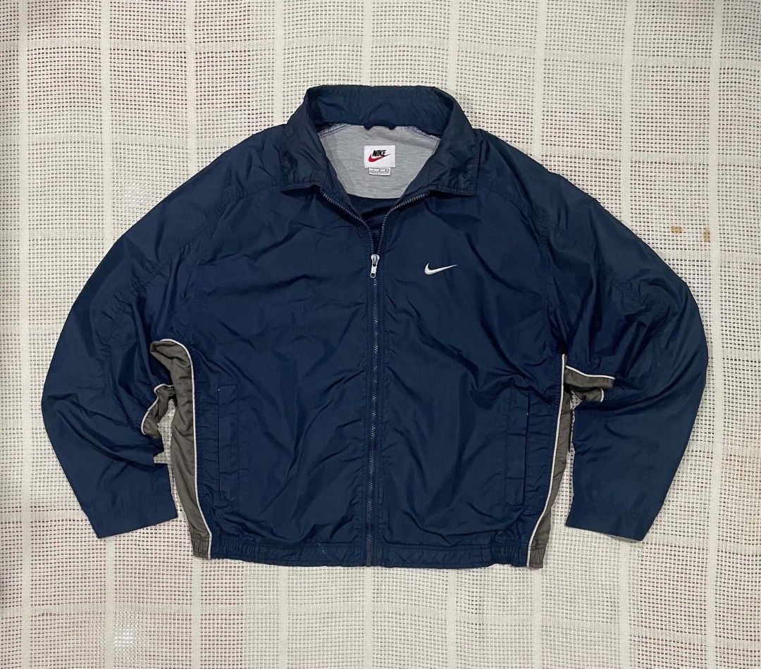 90s Vintage Nike Windbreaker Jacket (Category: Coats, Jackets and Outerwear) located in Bacolod City. Submitted by abkicks_apparel (Listing ID 1469726657, Image 1). Description: 90s Vintage Nike Windbreaker Jacket Large on Tag W24 L28 Authentic Original Excellent Condition No Hidden Issues .