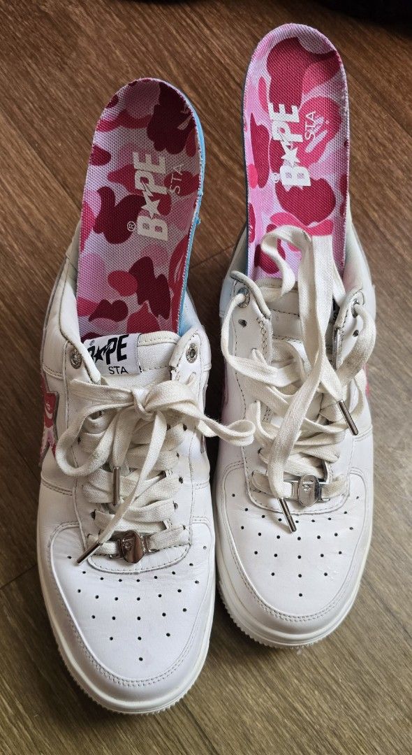 A Bathing Ape Bape Sta Low ABC Camo White Pink (Category: Sneakers) located in Quezon. Submitted by archivesss_666 (Listing ID 1469678340, Image 2). Description: - Authentic bape - Brand: A Bathing Ape (Bape) - Model: Bape Sta Low - Colorway: White leather with pink ABC camo star - Details: White laces, branded silver lace locks, pink camo insoles, Bape Sta tongue tags - Soles: White rubber outsoles with star patterns - Condition: Clean uppers wi